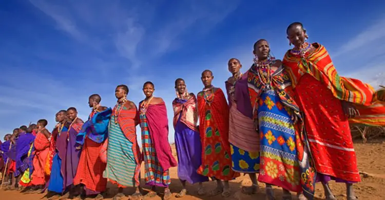 Maasai men and women in red and blue shukas